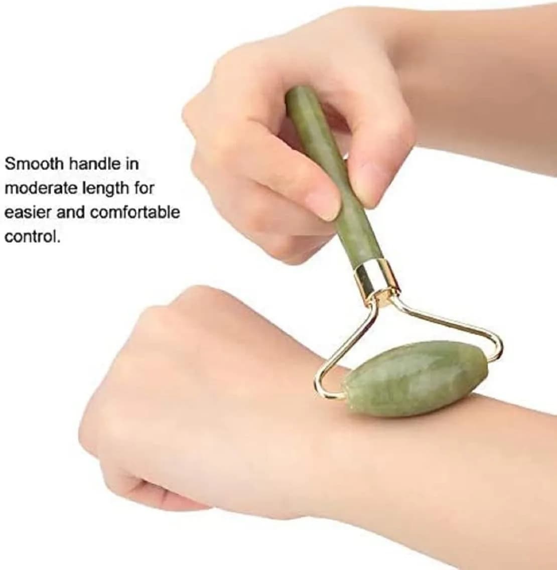 jade roller held in hand showing the handle