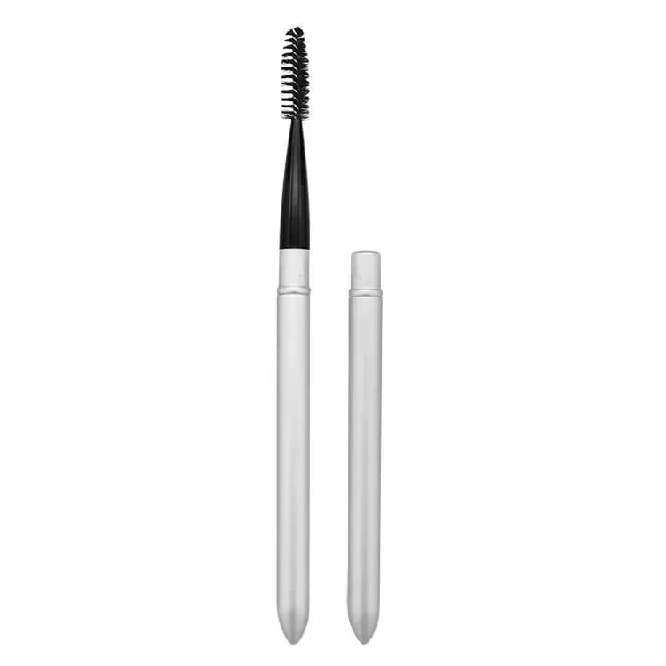 reusable lash spoolie standing upright next to its metal cap